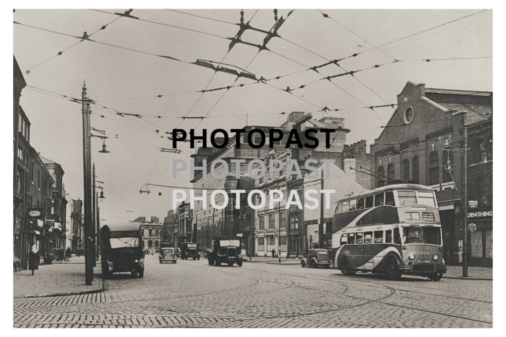 Old postcard showing a trolleybus on Great Ancoats Street, Manchester