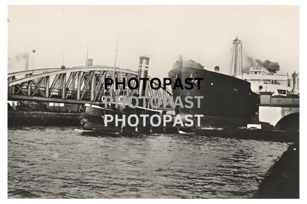 Old postcard of SS West Cobalt Passing The Barton Bridge, Manchester Ship Canal, Manchester